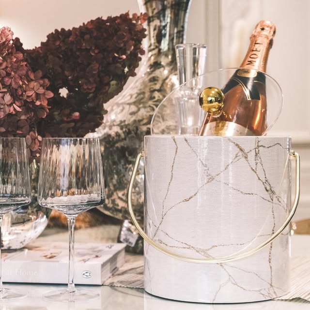 White patterned ice bucket on a dining table
